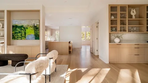 a view of a livingroom with furniture and front door