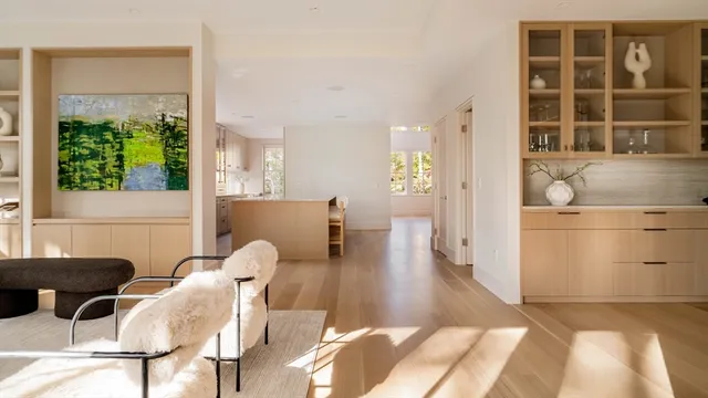 a view of a livingroom with furniture and front door