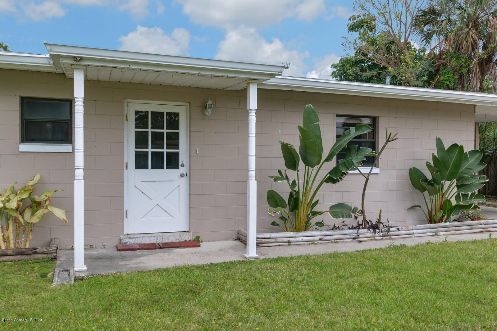 1014 Samar Road Cocoa Beach, FL 32931 - Photo 2 of 26 Front view of 1014 Samar