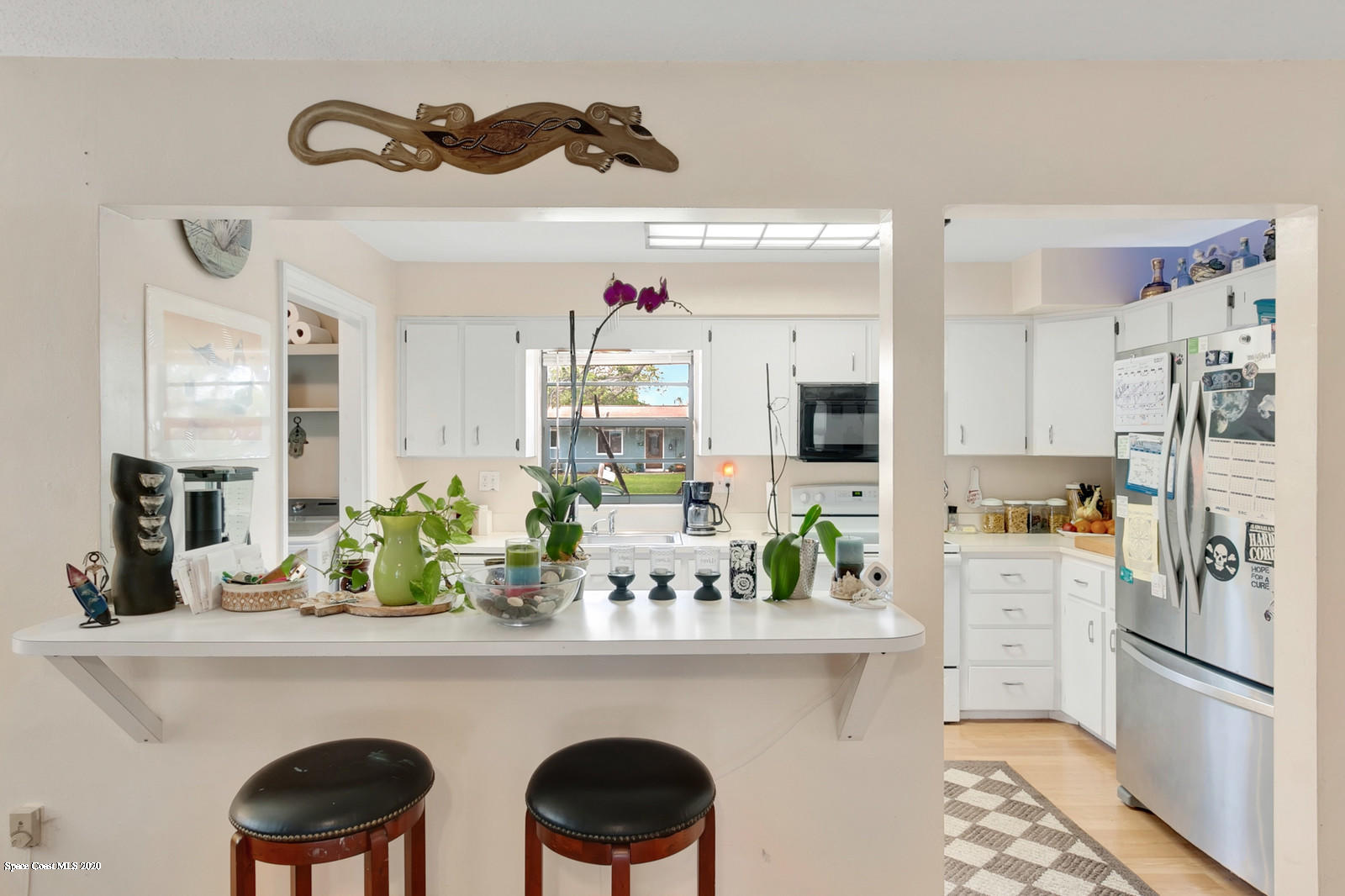 1014 Samar Road Cocoa Beach, FL 32931 - Photo 6 of 26 Kitchen w/bar seating