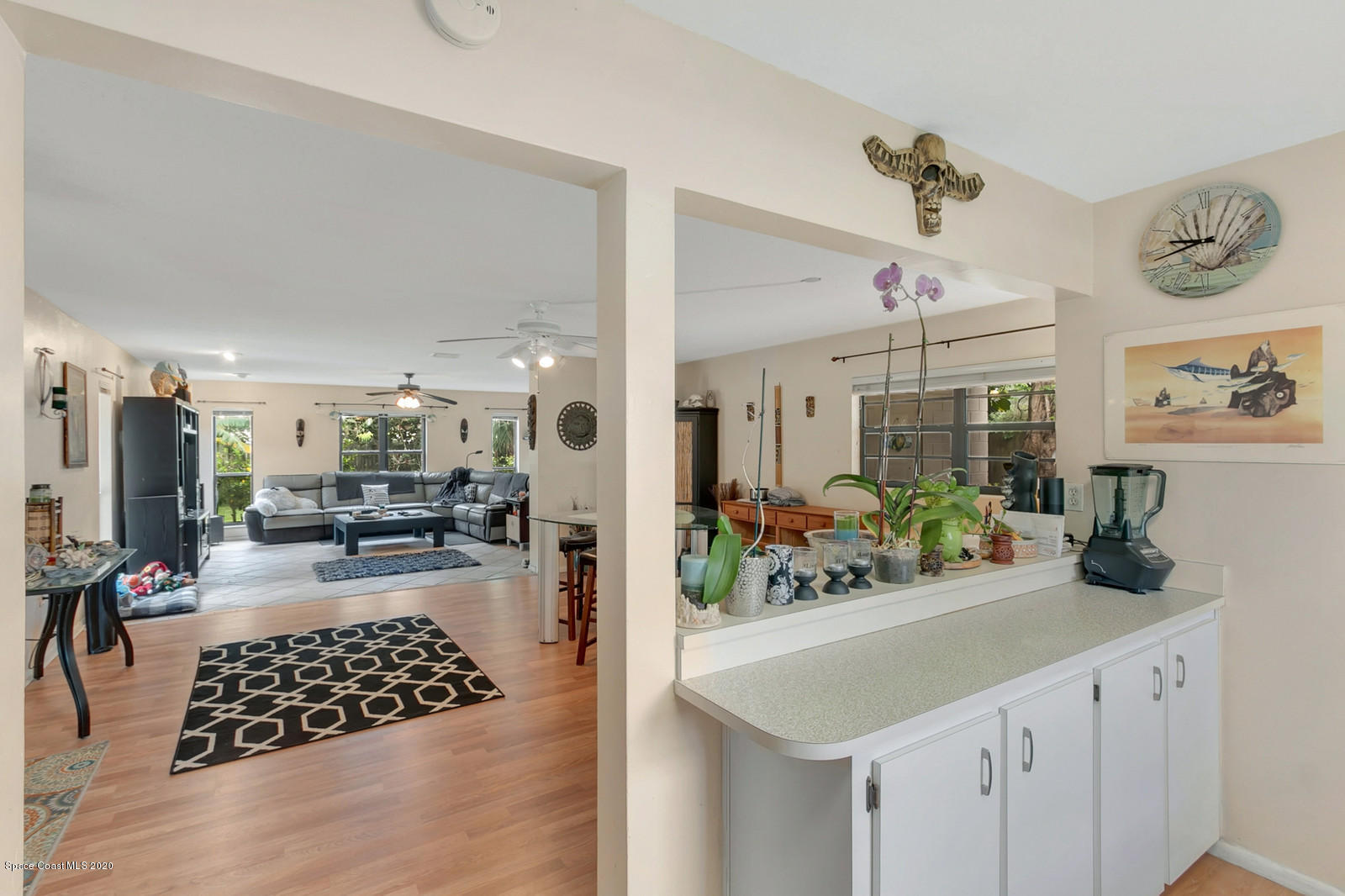 1014 Samar Road Cocoa Beach, FL 32931 - Photo 8 of 26 View from Kitchen into Living Room