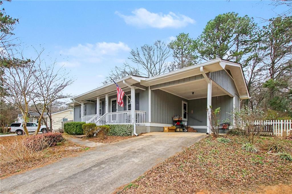 845 Idlewood Road Winder, GA 30680 - Photo 3 of 25 a front view of a house with a yard