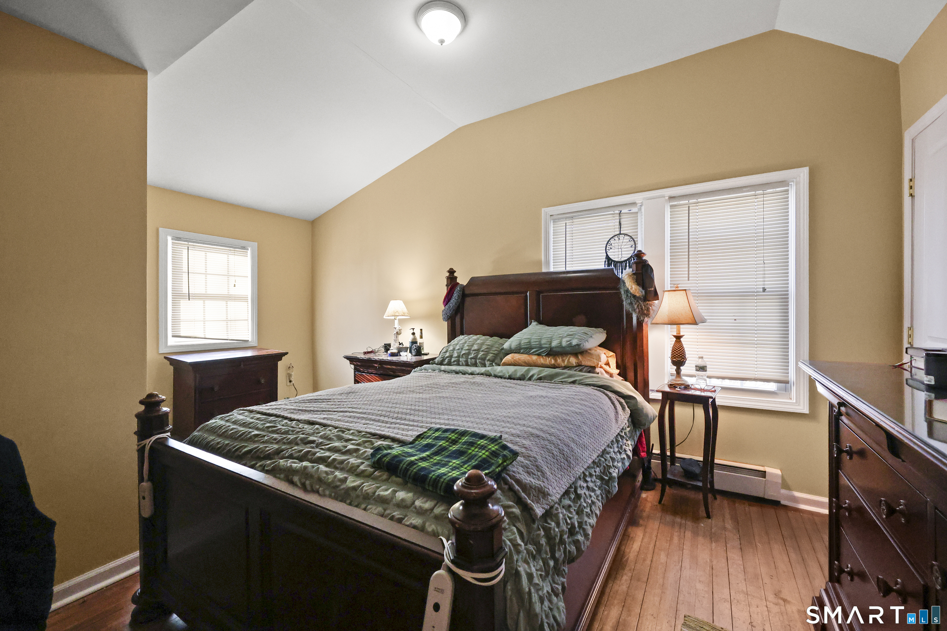 57 Foxon Place New Britain, CT 06053 - Photo 21 of 40 a bedroom with a bed and wooden floor