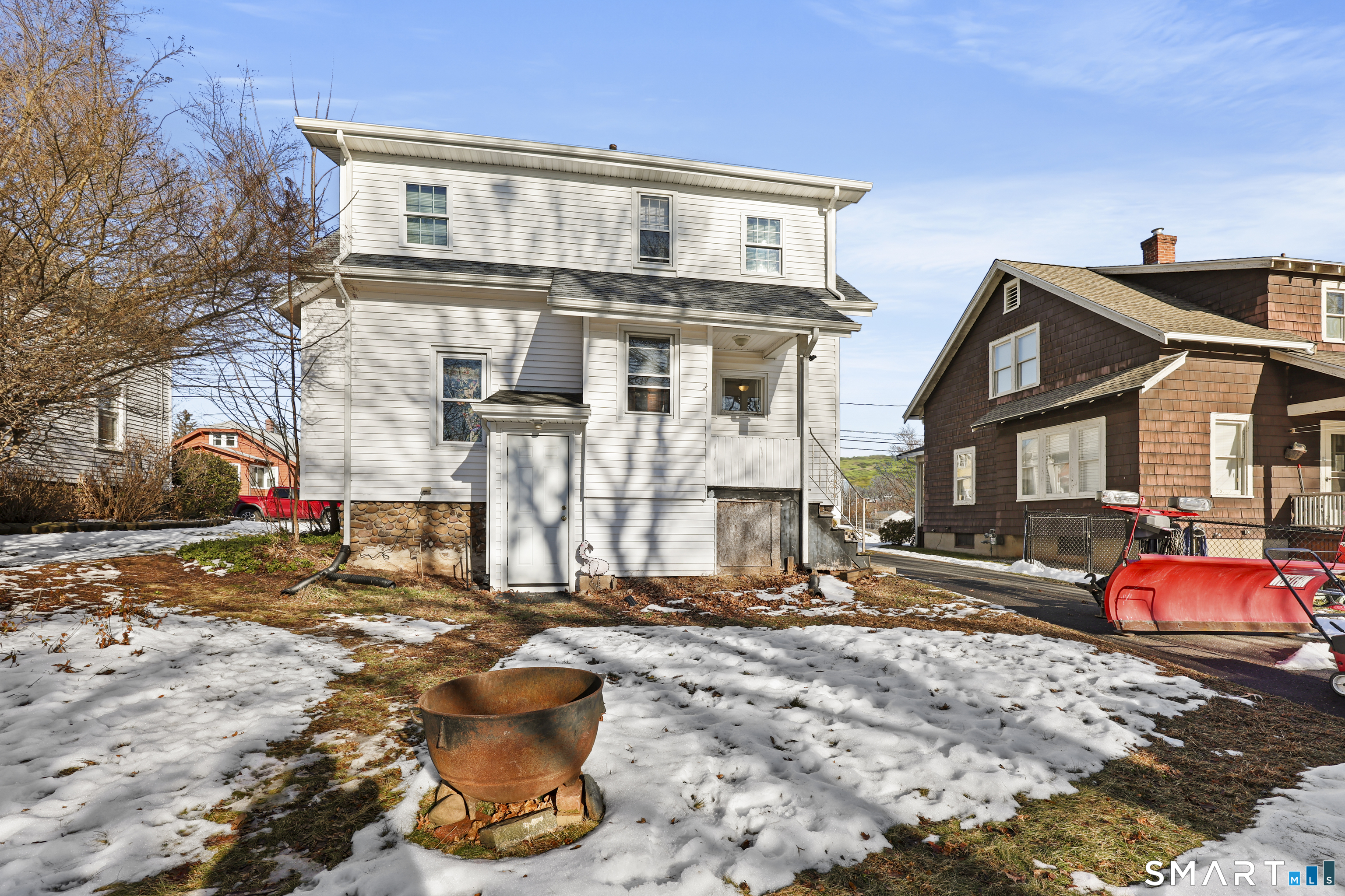57 Foxon Place New Britain, CT 06053 - Photo 5 of 40 a front view of a house with street