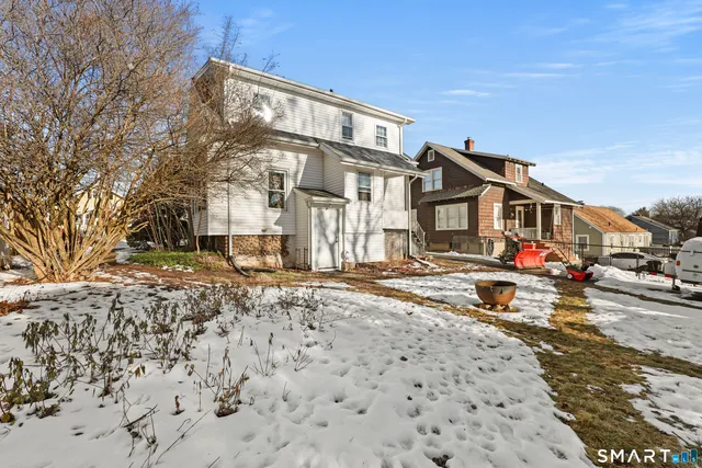 a front view of a building with a road