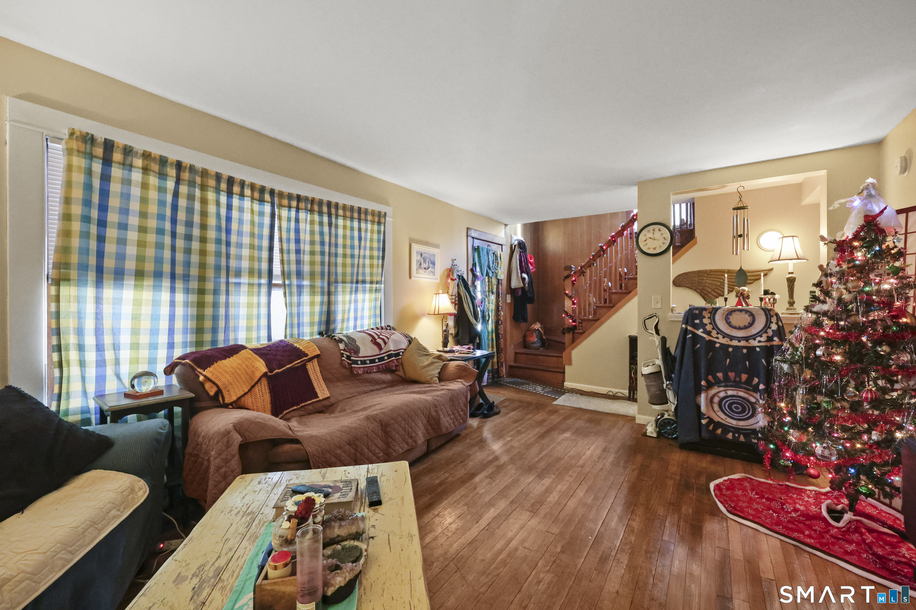 57 Foxon Place New Britain, CT 06053 - Photo 9 of 40 a living room with furniture and a flat screen tv