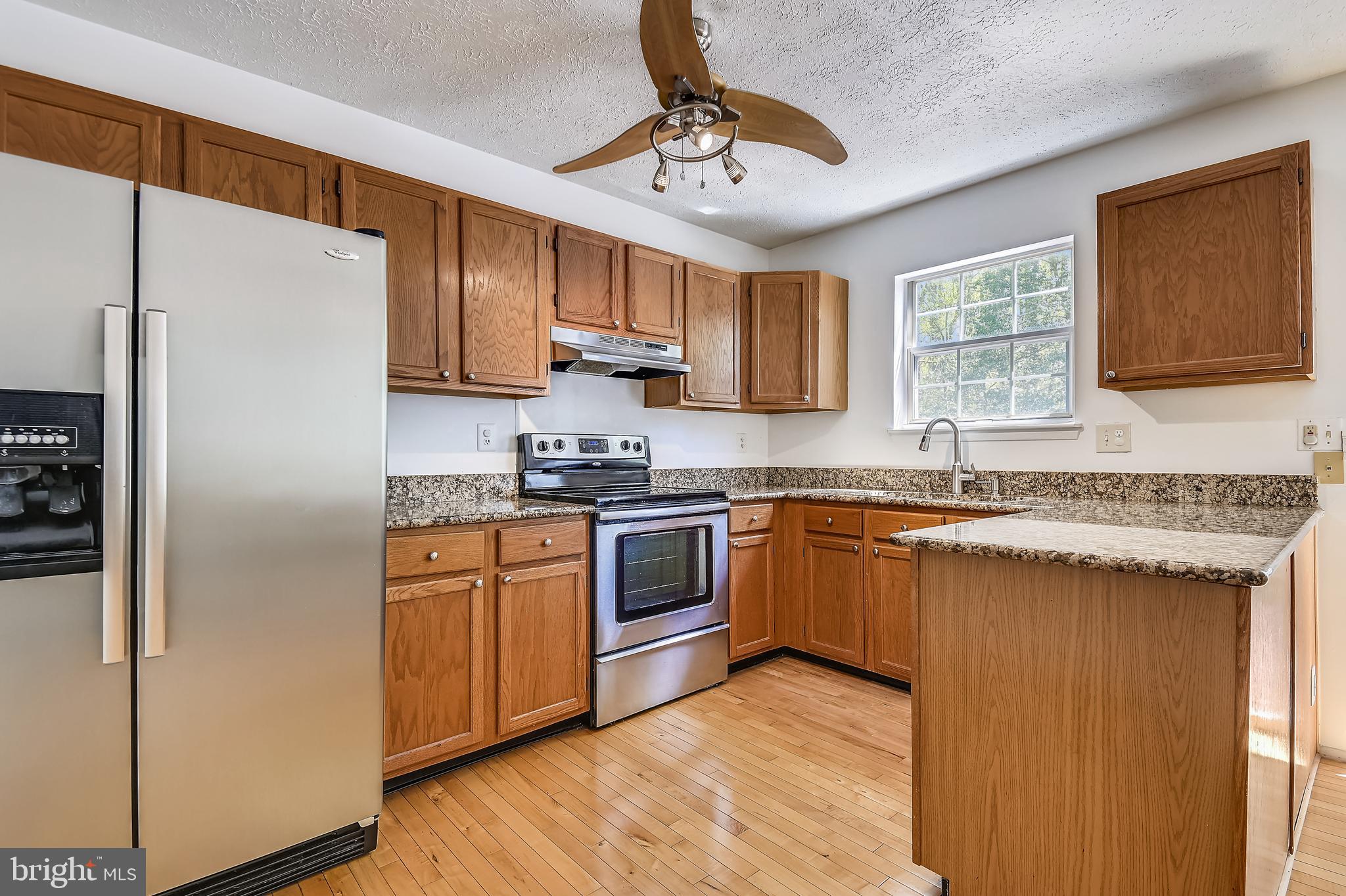4087 Rustico Road Middle River, MD 21220 - Photo 11 of 26 Stainless appliances and beautiful granite