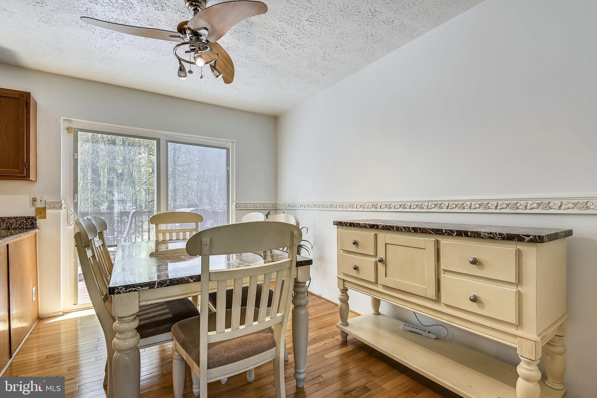 4087 Rustico Road Middle River, MD 21220 - Photo 12 of 26 Large dining area opening to deck