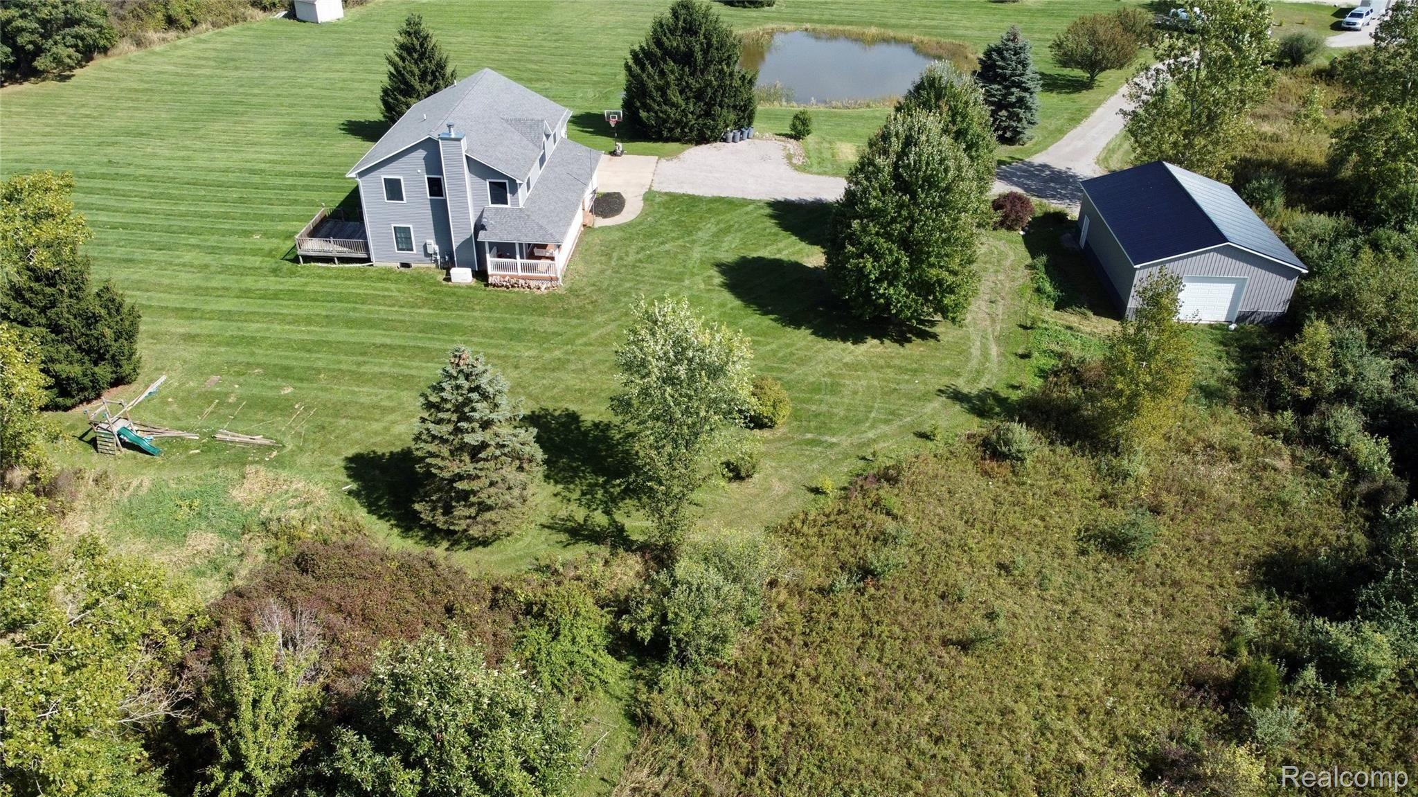 568 South Elba Road Lapeer, MI 48446 - Photo 7 of 43 Side aerial