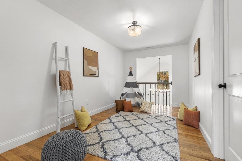 50 Azalea Circle Reading, MA 01867 - Photo 34 of 41 a bedroom with furniture and window