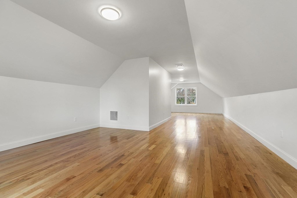50 Azalea Circle Reading, MA 01867 - Photo 36 of 41 wooden floor in an empty room with a window