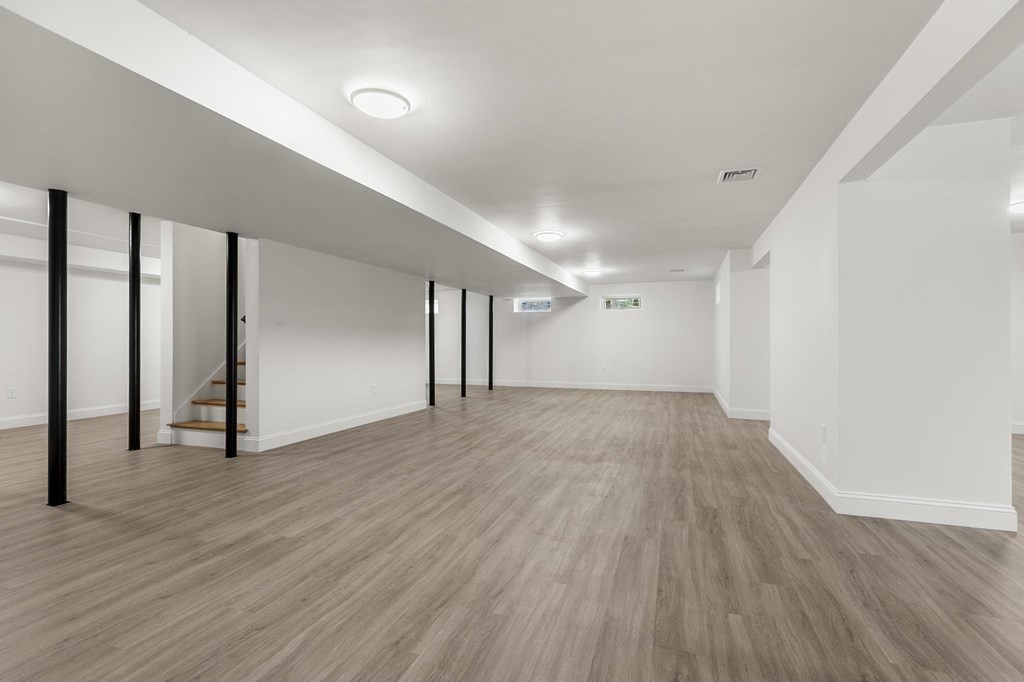 50 Azalea Circle Reading, MA 01867 - Photo 38 of 41 a view of empty room with wooden floor