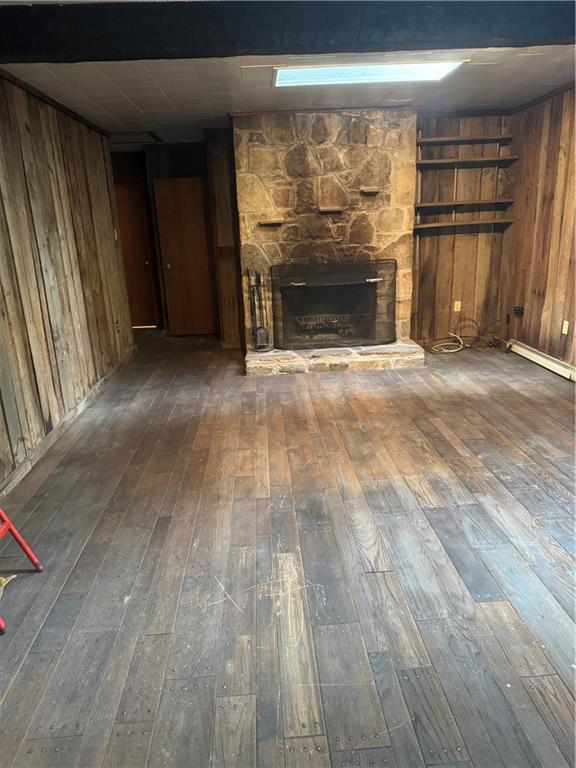 117 Chestnut Ridge Road Acme, PA 15610 - Photo 4 of 26 a view of empty room with wooden floor and fireplace