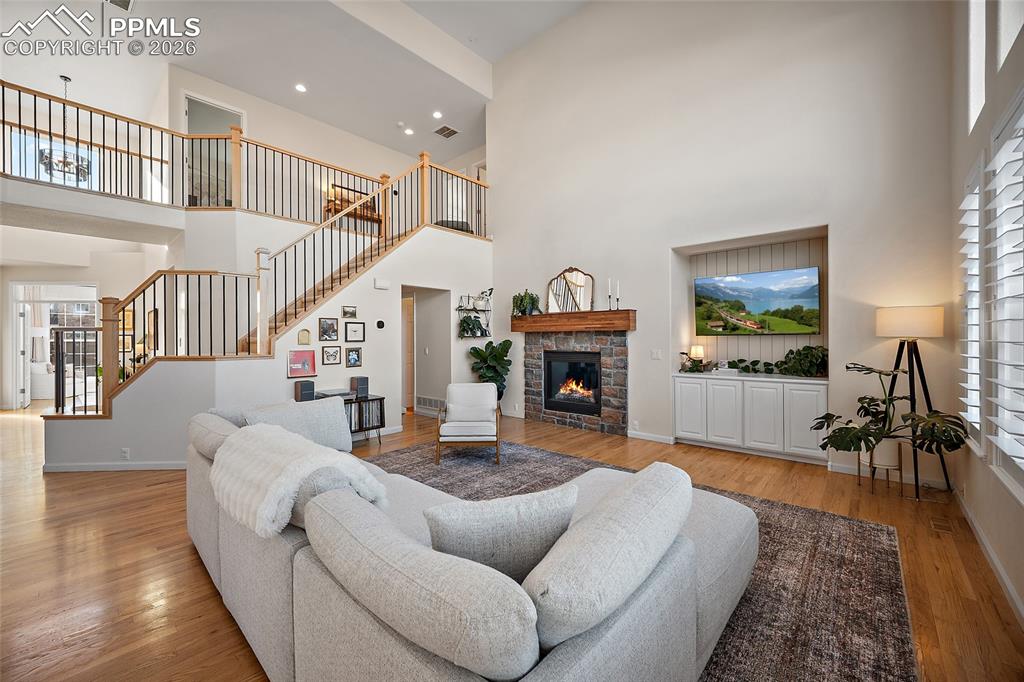 9393 St.George Road Peyton, CO 80831 - Photo 19 of 49 a living room with furniture and a fireplace