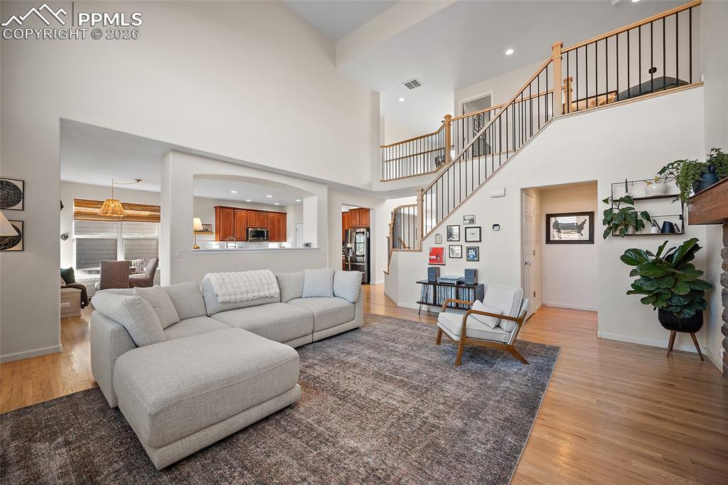 9393 St.George Road Peyton, CO 80831 - Photo 22 of 49 a living room with furniture and wooden floor
