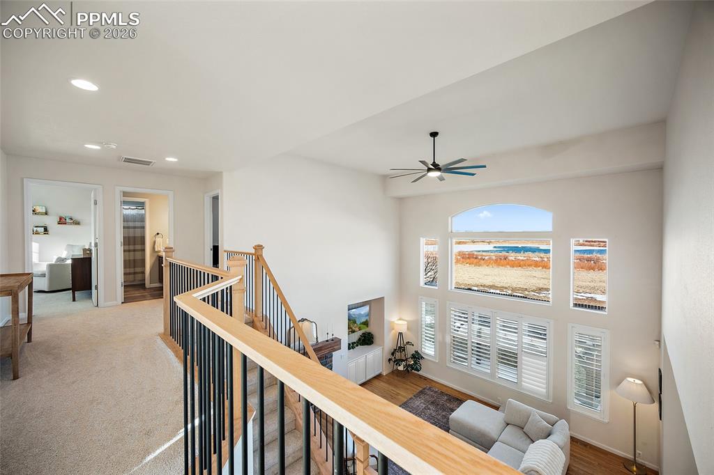 9393 St.George Road Peyton, CO 80831 - Photo 26 of 49 a living room with furniture and a table