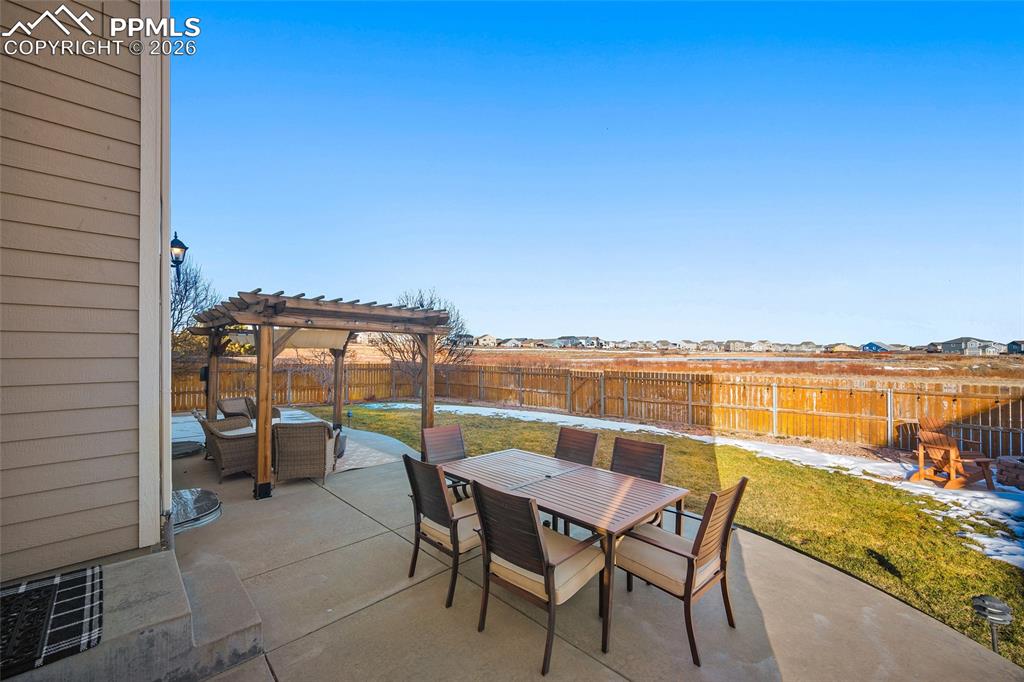 9393 St.George Road Peyton, CO 80831 - Photo 44 of 49 a view of a terrace with sitting area