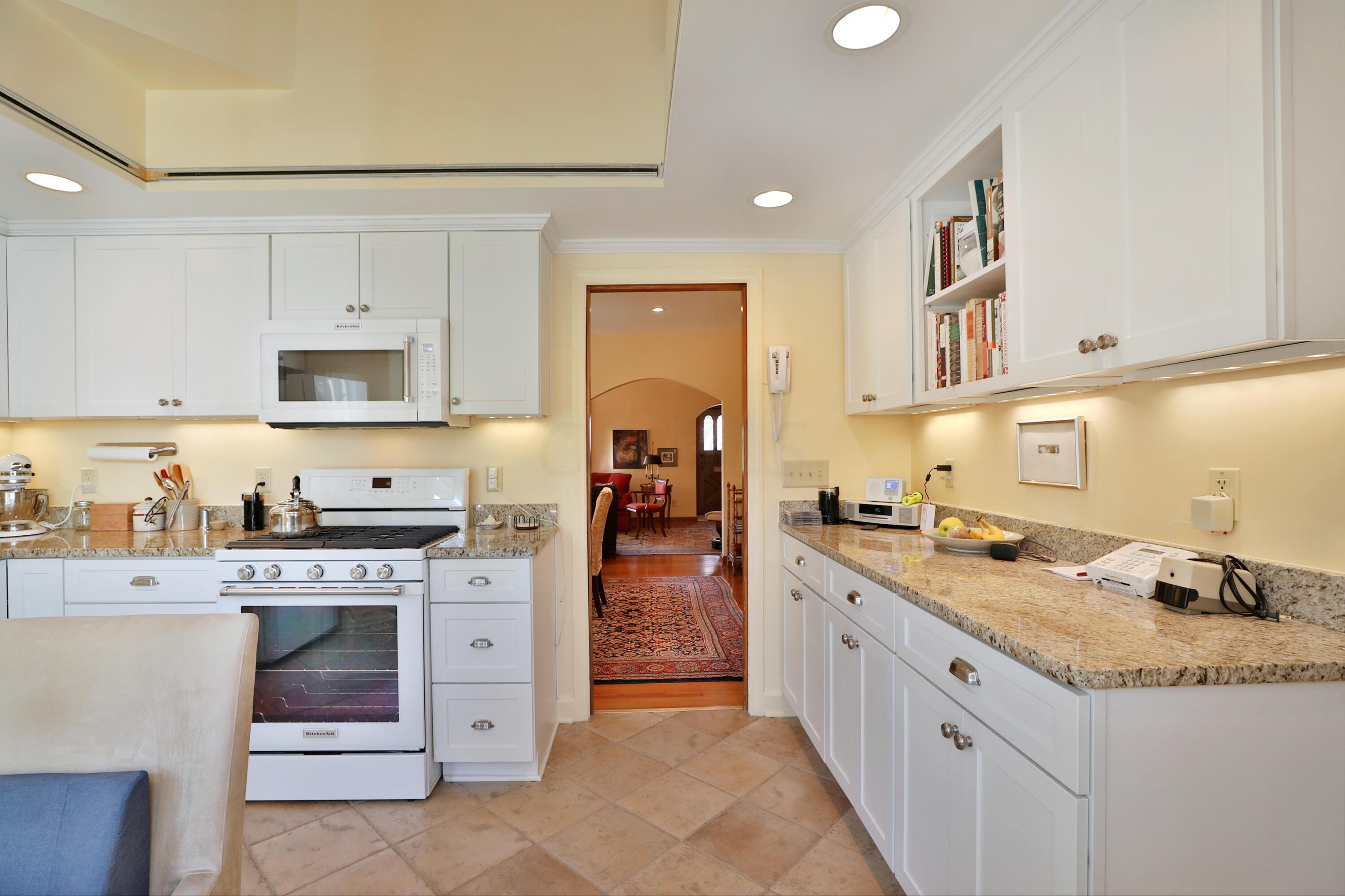 4436 Zeller Road Columbus, OH 43214 - Photo 13 of 42 Kitchen: New stove '21, microwave '21, refrigerator '20