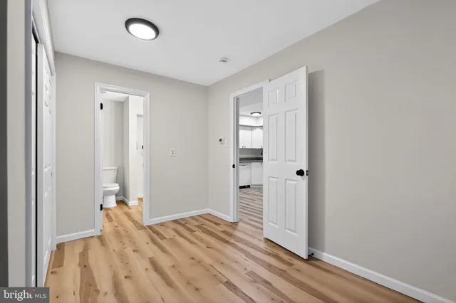 a view of a chair and table in the balcony