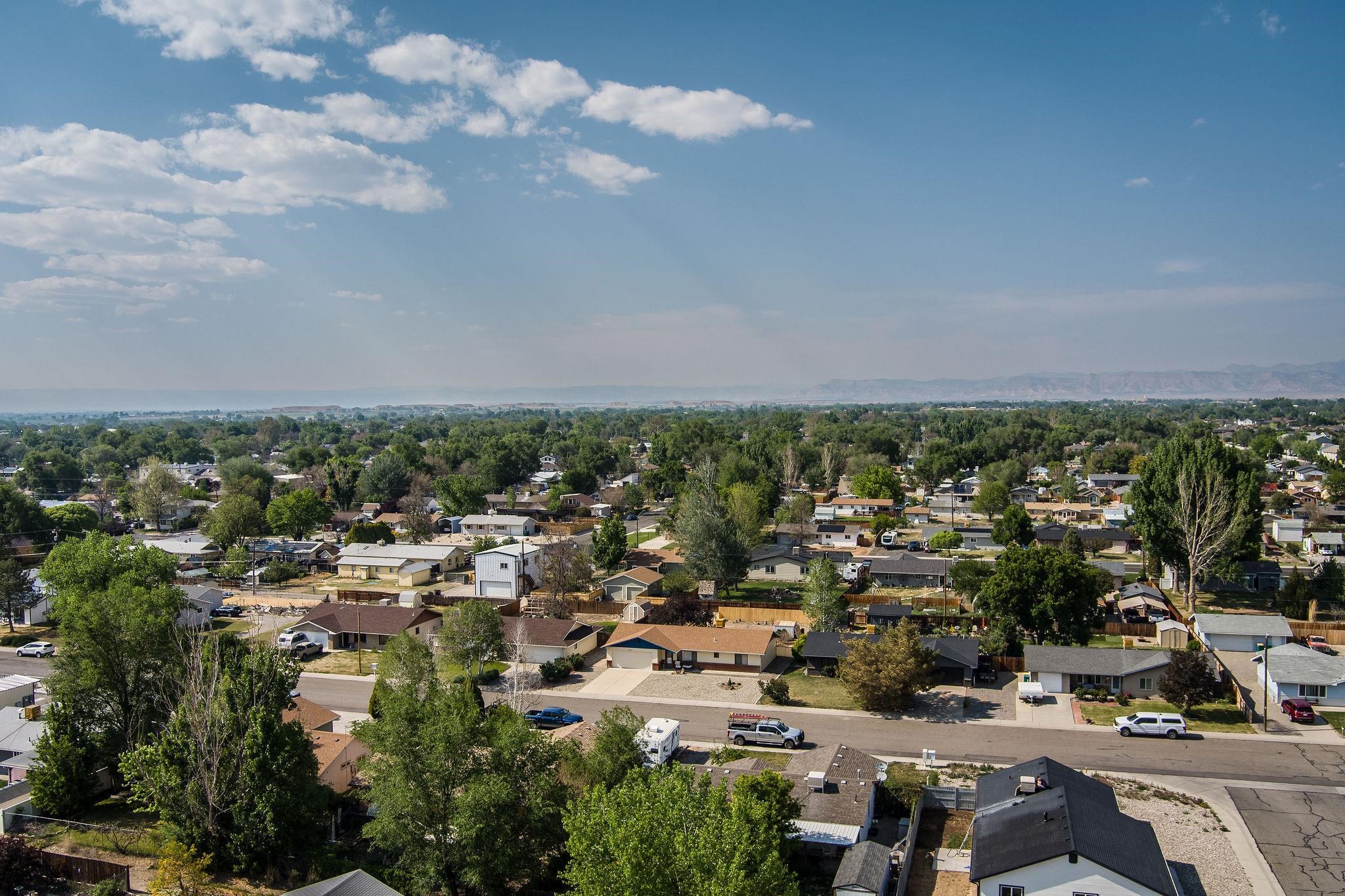 455 David Court Fruita, CO 81521 - Photo 26 of 28 an aerial view of a city with lots of residential buildings
