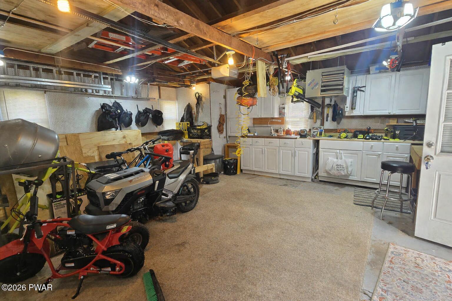 430 Griffith Road Tyler Hill, PA 18469 - Photo 27 of 31 a storage room with washer and dryer