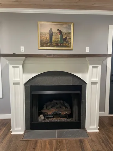 a living room with a fireplace