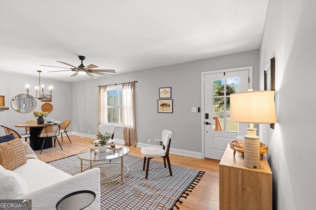 80 Hand Road Bowdon, GA 30108 - Photo 14 of 82 a living room with furniture and a table