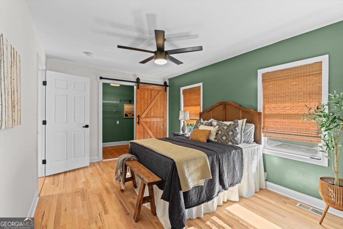 80 Hand Road Bowdon, GA 30108 - Photo 18 of 82 a bedroom with a bed and a window