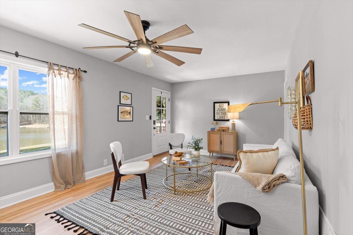 80 Hand Road Bowdon, GA 30108 - Photo 6 of 82 a living room with furniture and a window