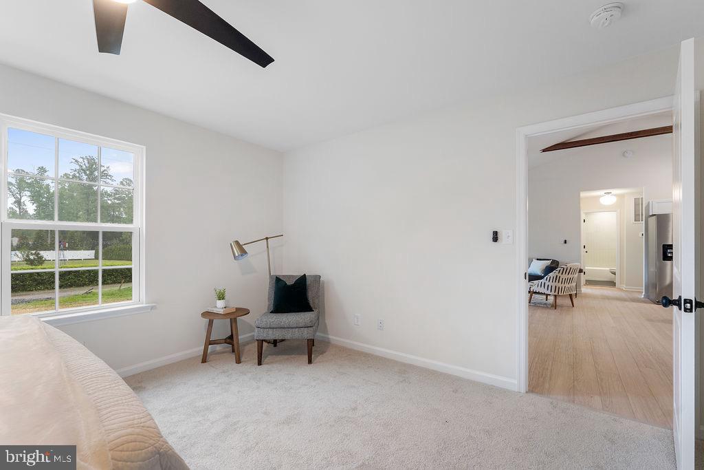 26332 Old Pitts Road Ruther Glen, VA 22546 - Photo 20 of 35 a living room with furniture and a window