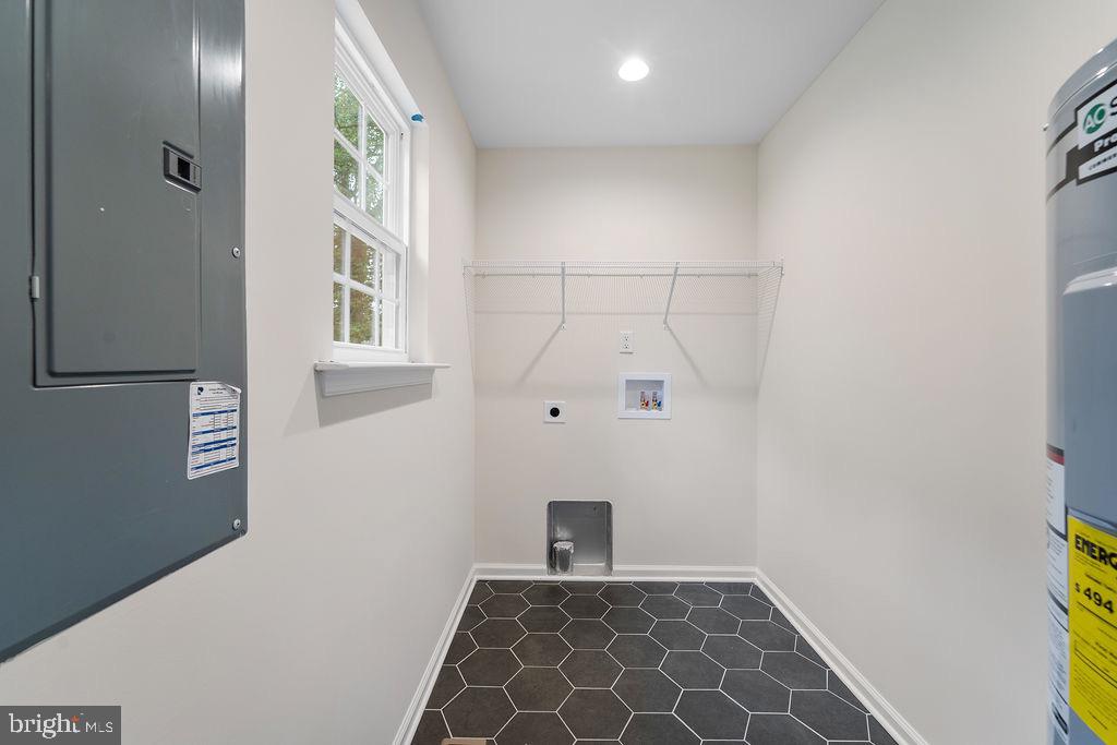 26332 Old Pitts Road Ruther Glen, VA 22546 - Photo 22 of 35 a view of a hallway with windows
