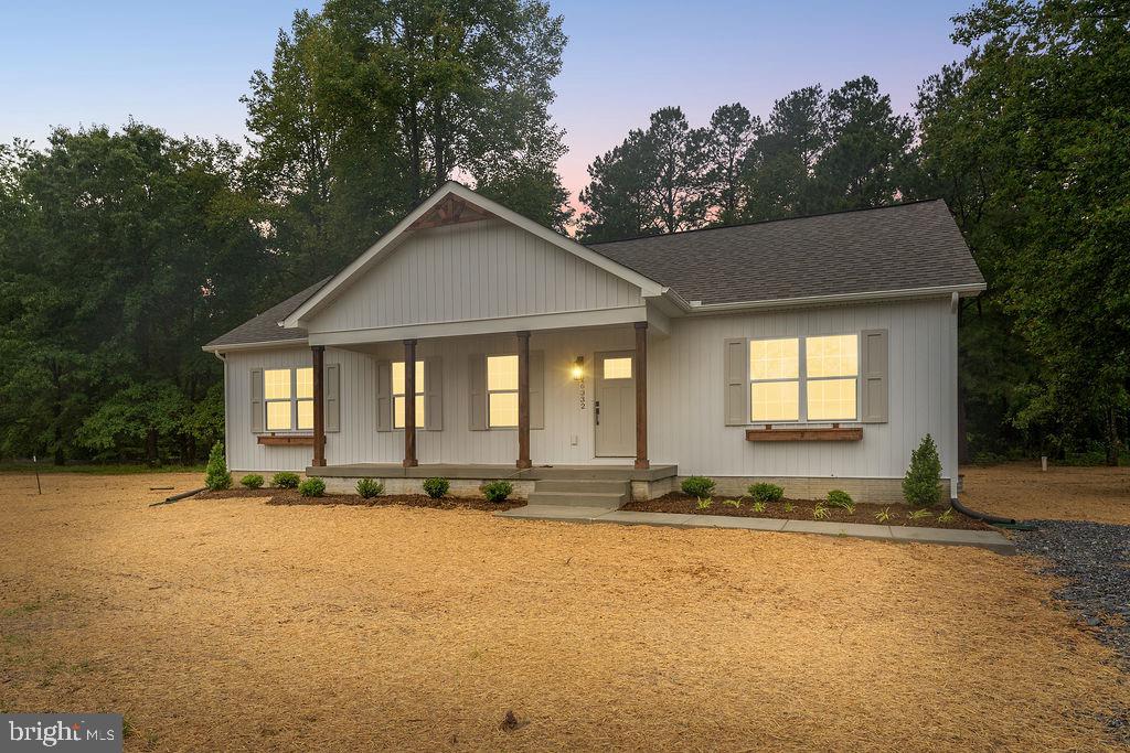 26332 Old Pitts Road Ruther Glen, VA 22546 - Photo 35 of 35 a front view of a house with a yard