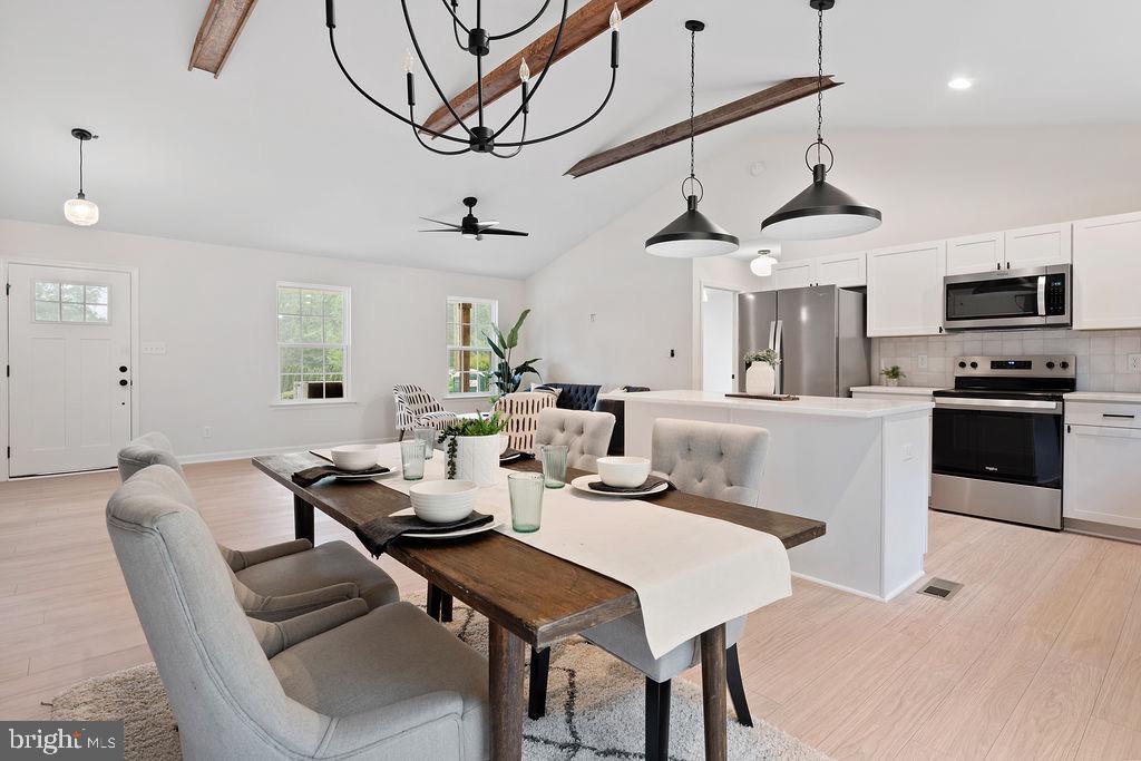 26332 Old Pitts Road Ruther Glen, VA 22546 - Photo 5 of 35 a view of a dining room with furniture