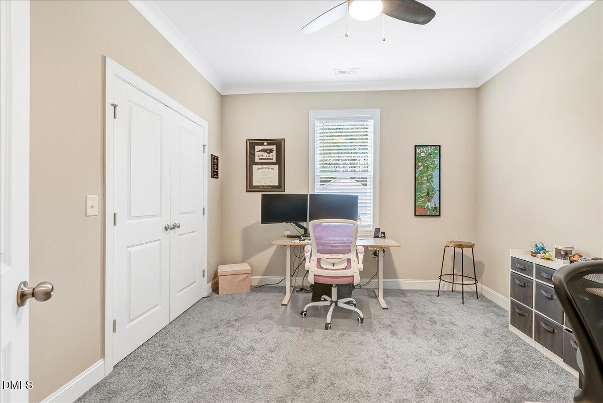 1208 Montgomery Road Franklinton, NC 27525 - Photo 30 of 61 a living room with furniture a piano and a window