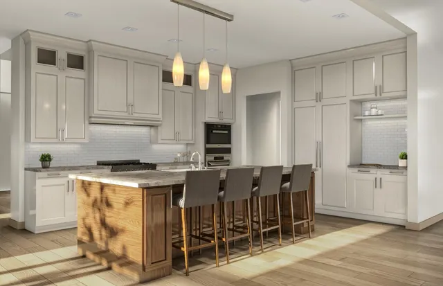 a open kitchen with stainless steel appliances granite countertop a stove and a refrigerator