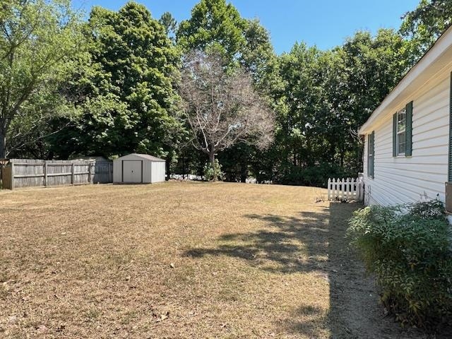 178 Portersville Road Brighton, TN 38011 - Photo 3 of 14 View of yard with a storage shed