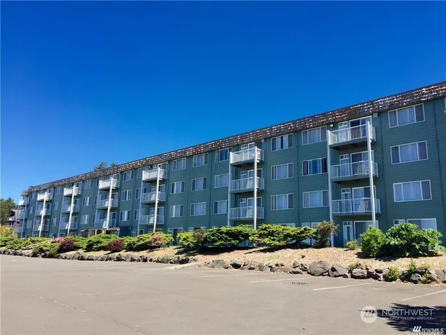 a view of a city with ocean view