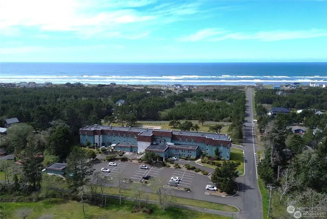 an aerial view of a house with a garden
