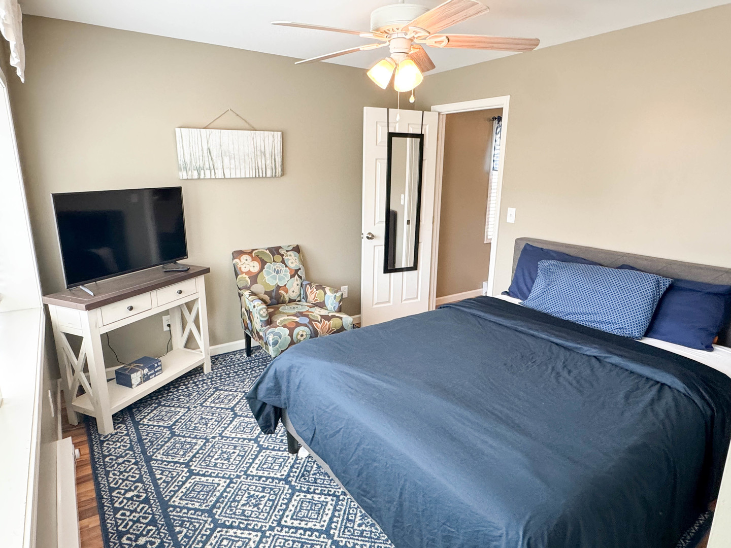 113 Lafayette Street Anna, IL 62906 - Photo 20 of 33 a bedroom with a bed and a flat screen tv