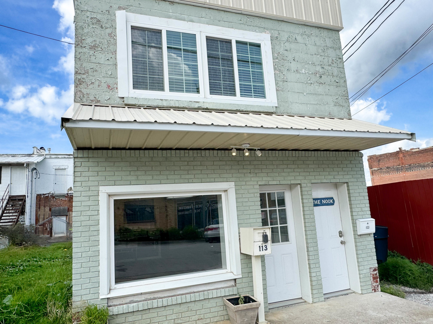 113 Lafayette Street Anna, IL 62906 - Photo 2 of 33 a building with a entrance