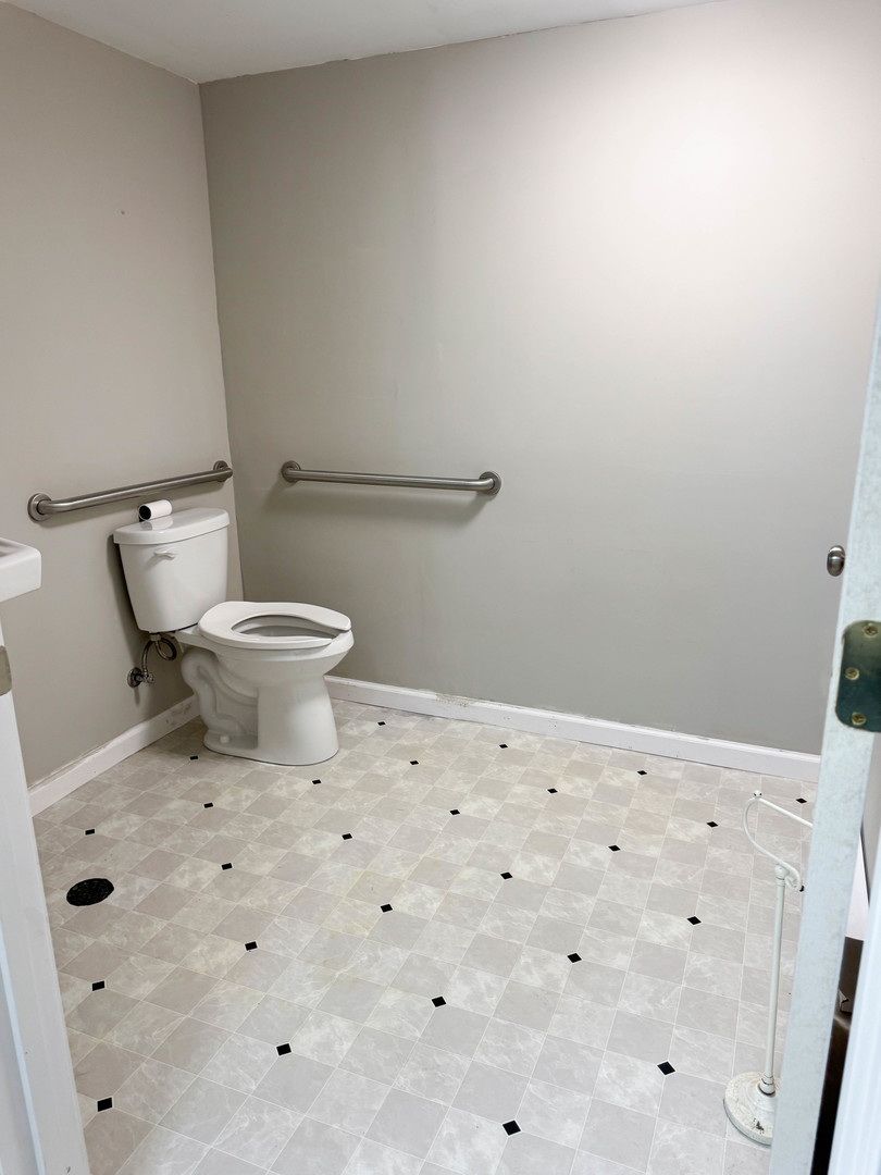 113 Lafayette Street Anna, IL 62906 - Photo 32 of 33 a white toilet sitting next to a bathroom sink