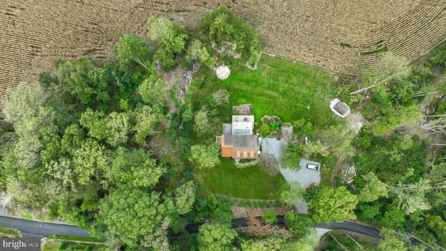 a view of a swimming pool with a table and chairs