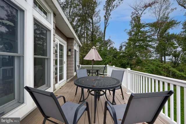 a view of chairs and wooden floor