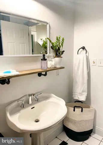 a kitchen with stainless steel appliances granite countertop a refrigerator stove and sink