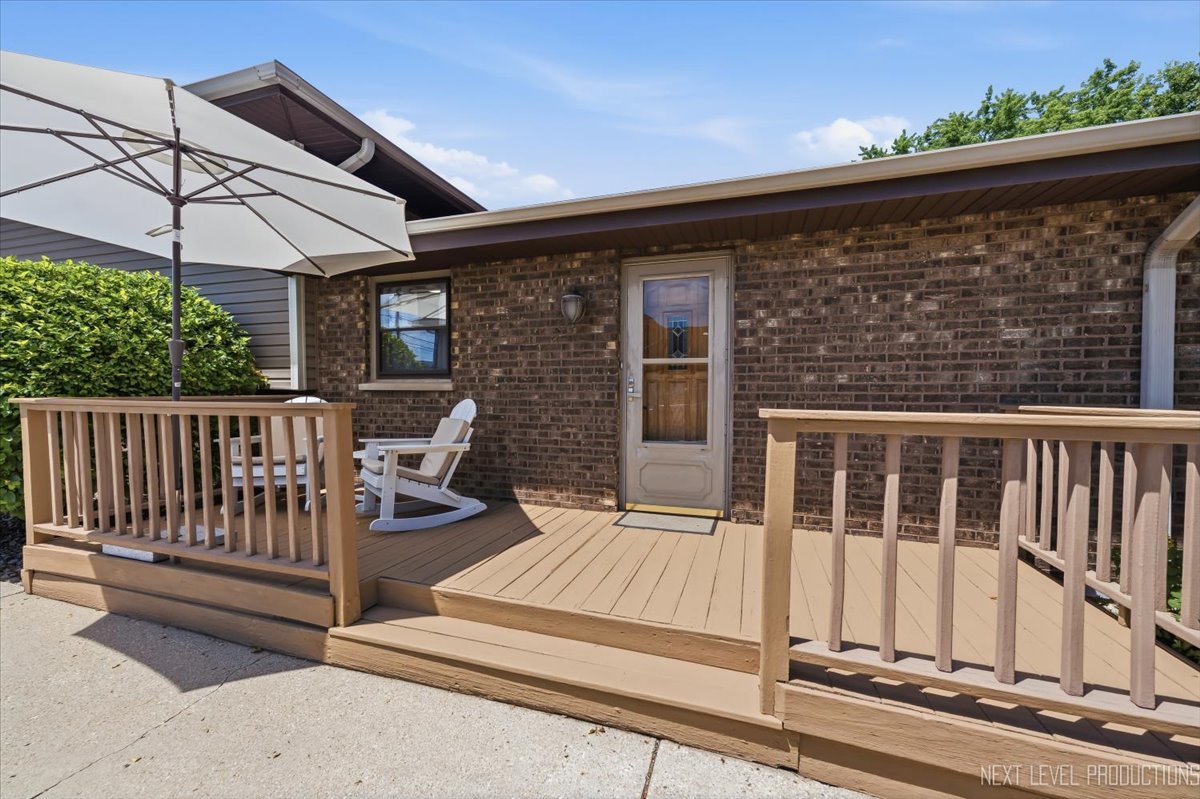 754 North Michigan Street Elmhurst, IL 60126 - Photo 27 of 32 a view of a patio with table and chairs and potted plants