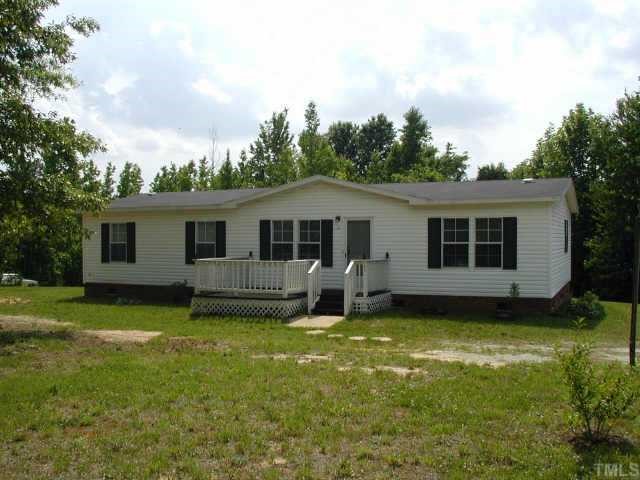 186 Gravitte Road Roxboro, NC 27573 - Photo 1 of 1 a view of a house with a yard and sitting area
