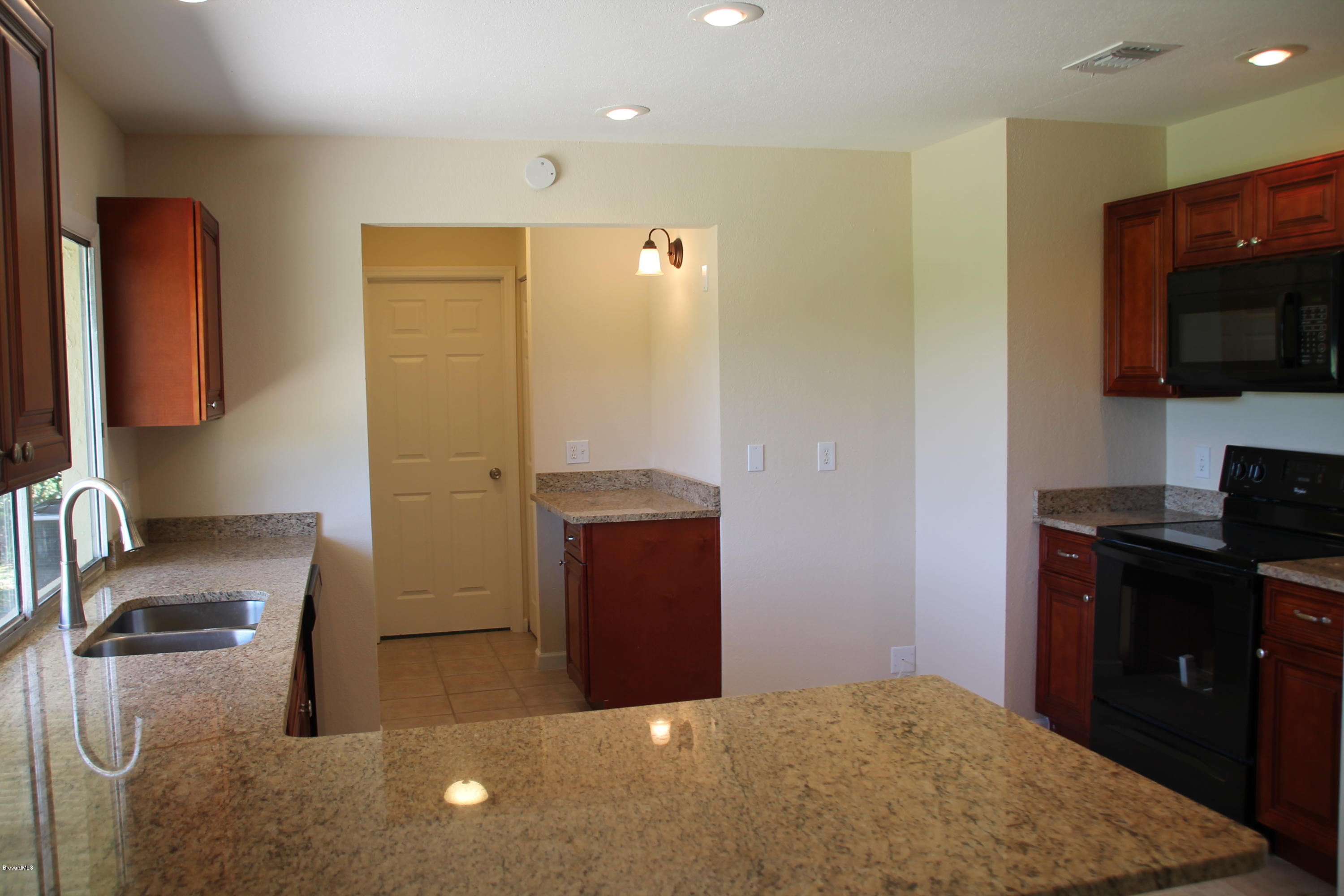 941 Riviera Drive Northeast Palm Bay, FL 32905 - Photo 2 of 15 Delmonico 076