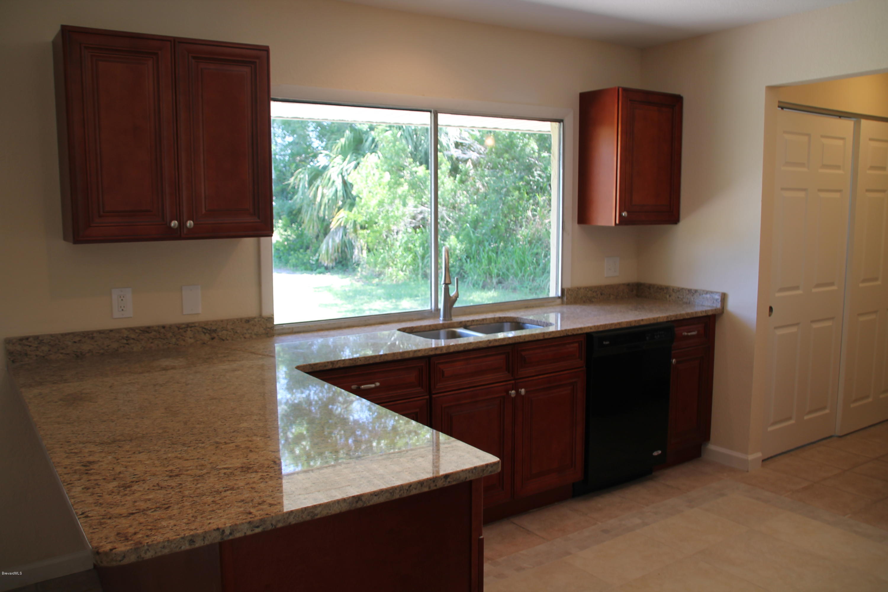 941 Riviera Drive Northeast Palm Bay, FL 32905 - Photo 3 of 15 Delmonico 073
