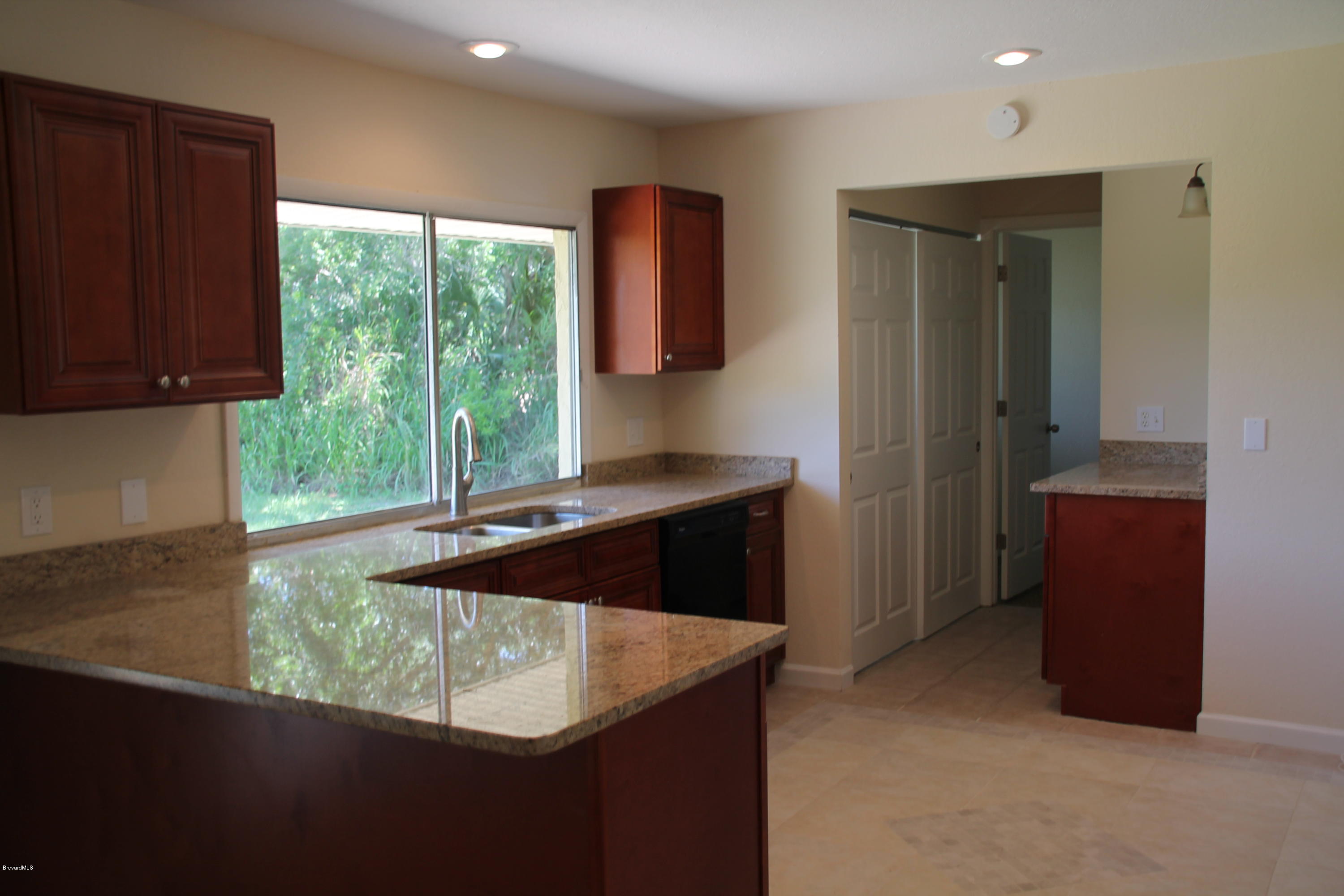 941 Riviera Drive Northeast Palm Bay, FL 32905 - Photo 4 of 15 Delmonico 060