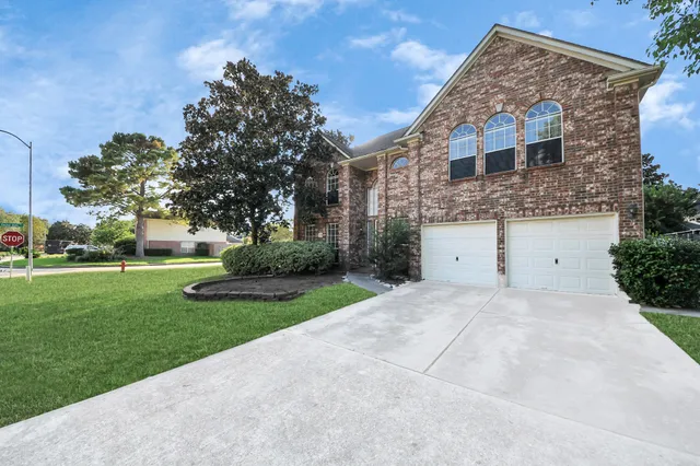 a house view with a garden space